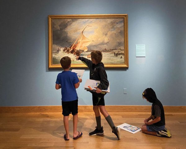 Kids looking at painting