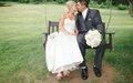 Whitney Furst Photography rustic wedding couple kissing on park swing